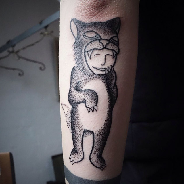 dotwork tattoo on arm