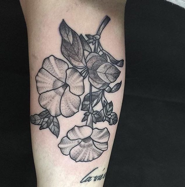 black and grey flowers tattoo