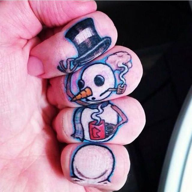 snowman tattoo on fingers