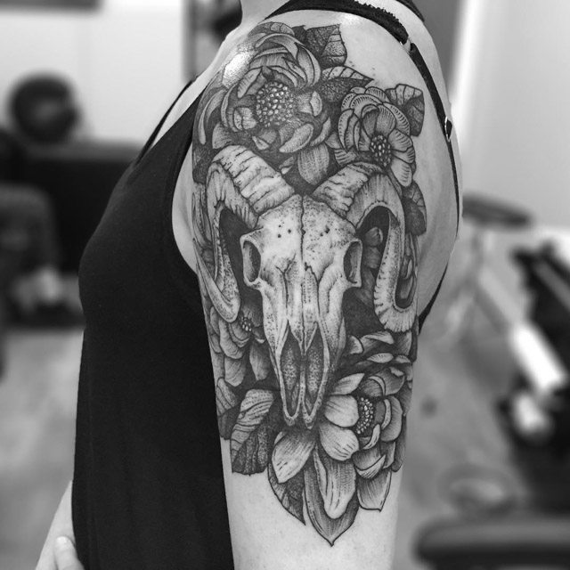 shoulder skull ram tattoo