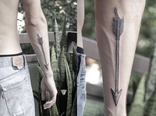 arrow tattoo on forearm