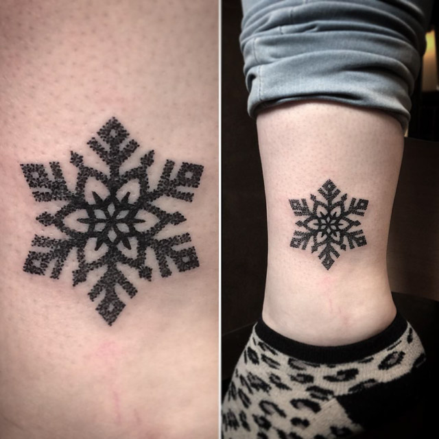 black snowflake tattoo on ankle