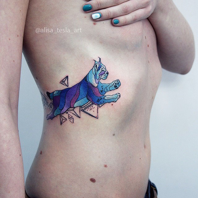 rib tattoo lynx