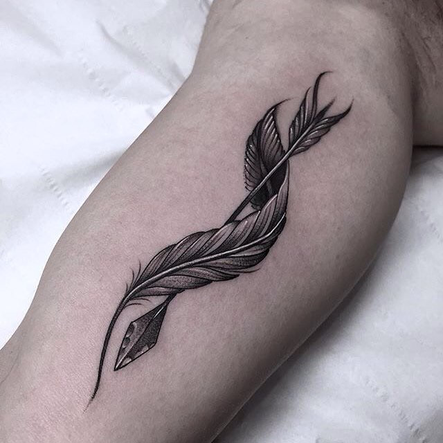 arrow and twisted feather tattoo
