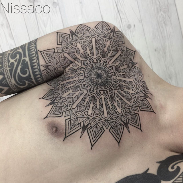 mandala tattoo on front of the shoulder
