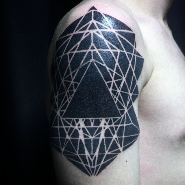 blackwork tattoo on shoulder geometrical