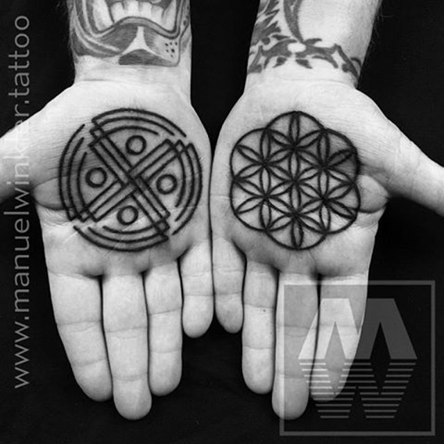 geometrical palm tattoos