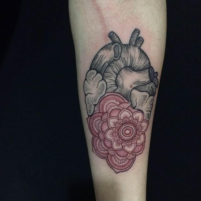 etching anatomical heart tattoo with mandala