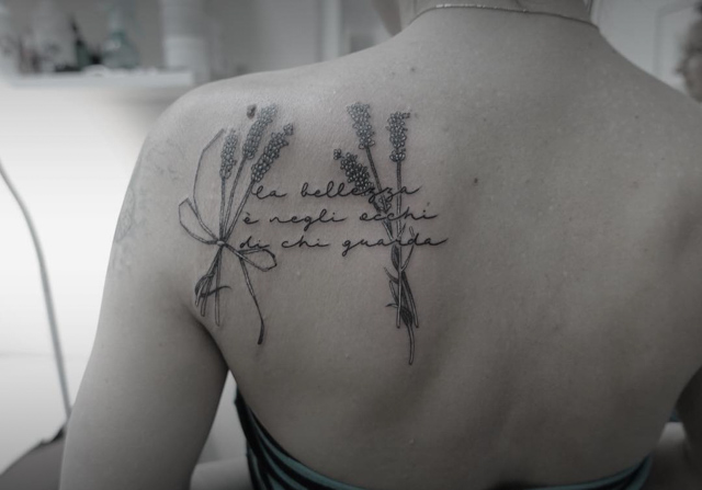 shoulder blade lavender tattoo and lettering