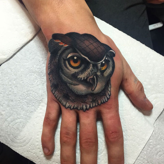 owl tattoo on hand
