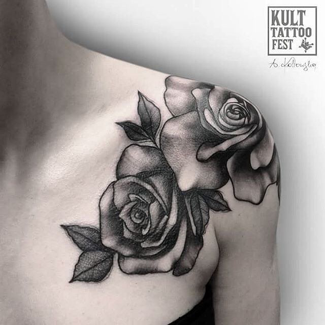 grey roses tattoo on shoulder