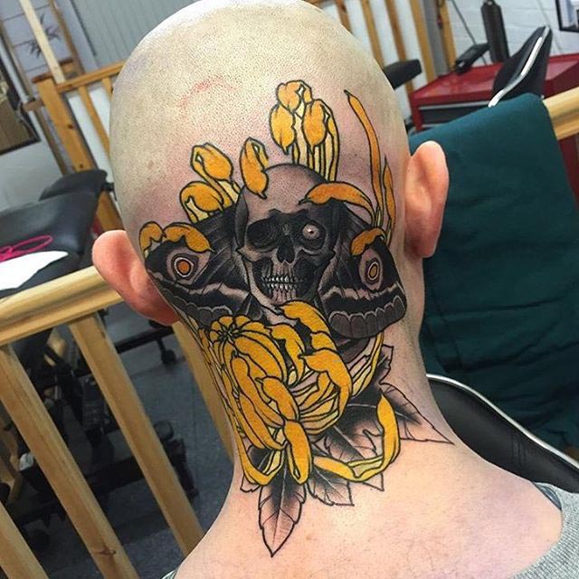 yellow flower skeleton tattoo on head