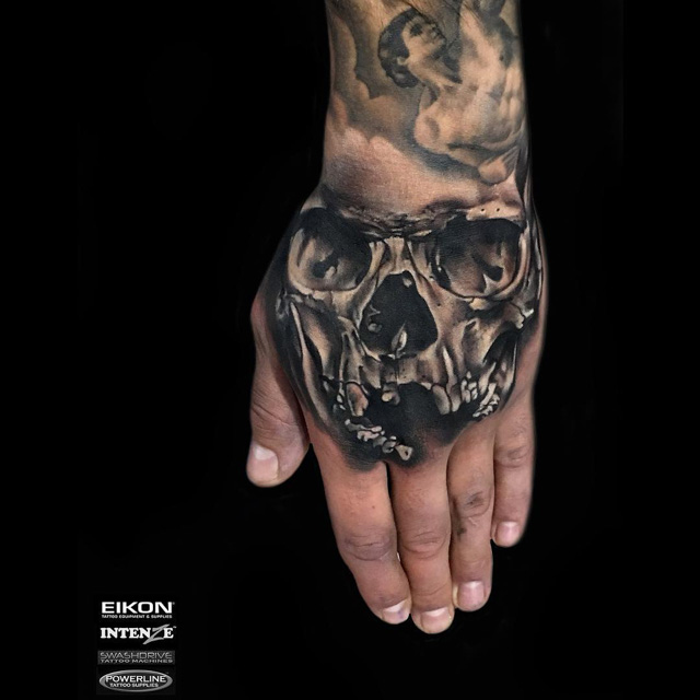 hand tattoo skull black and grey