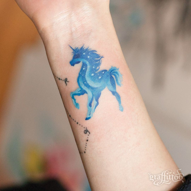 blue unicorn small tattoo