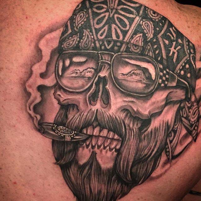 cigar smoking skull tattoo