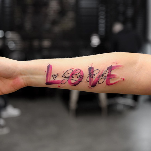 pink love tattoo word