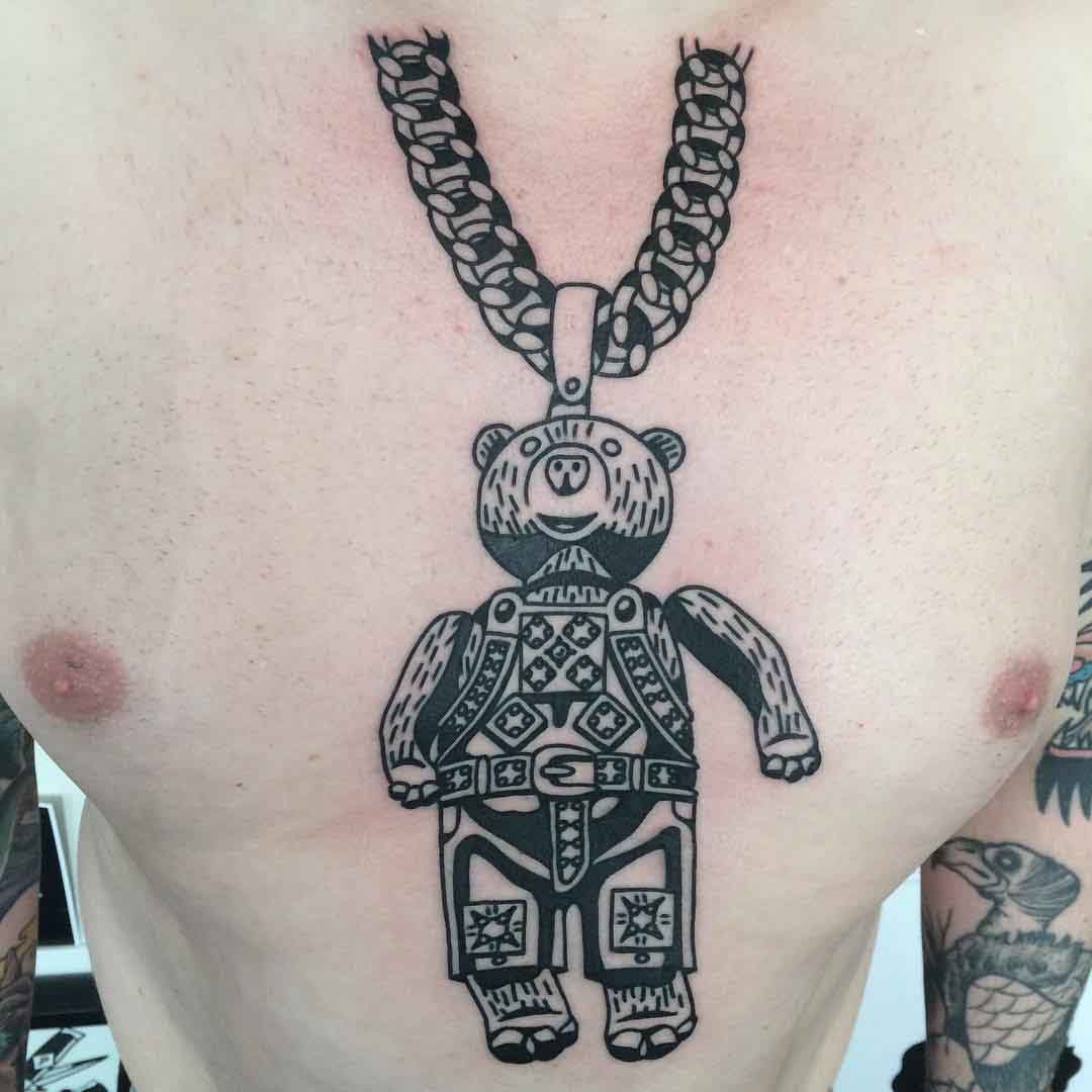 bear chest tattoo medallion