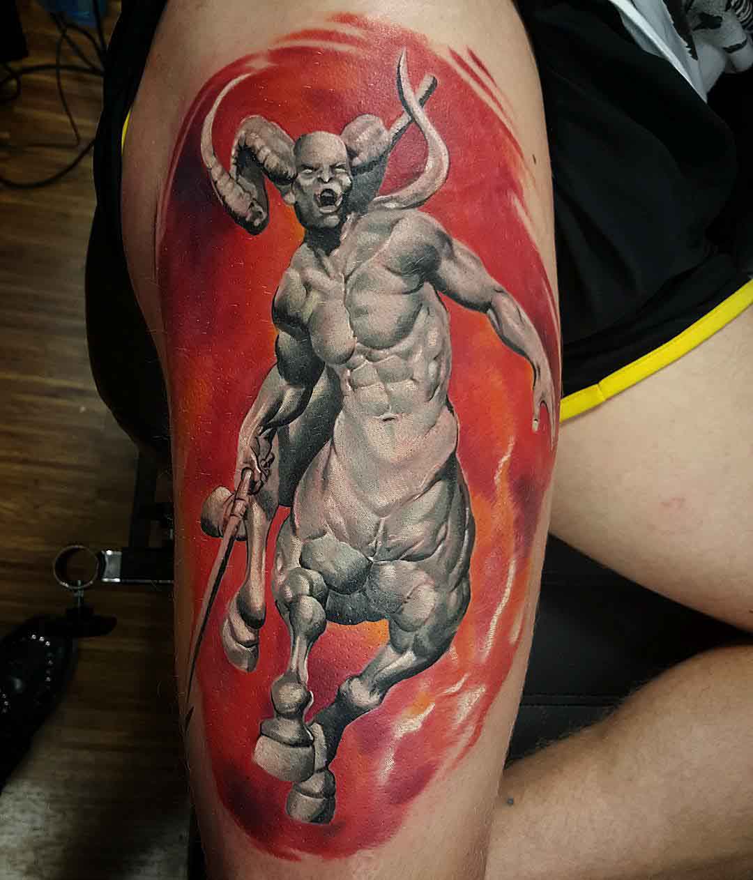 grey centaur tattoo on hip