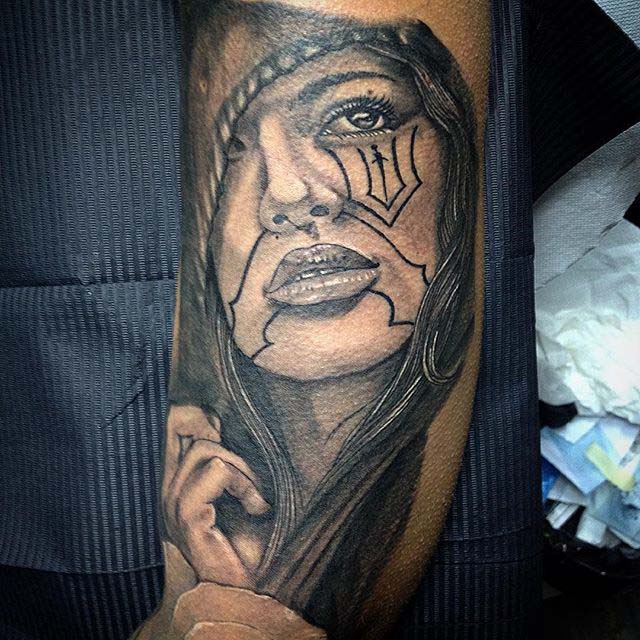 woman face tattoo Chicano