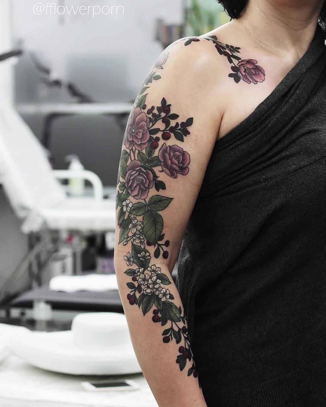 a lot of flowers tattoo sleeve