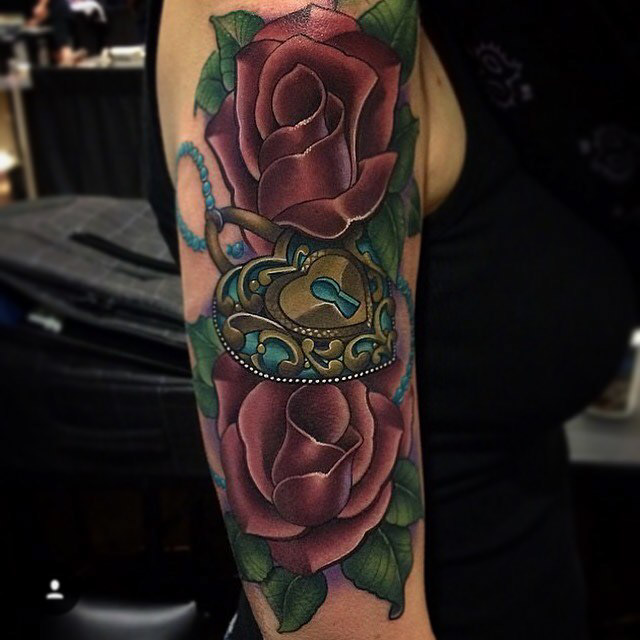 heart-shaped locket with roses tattoo