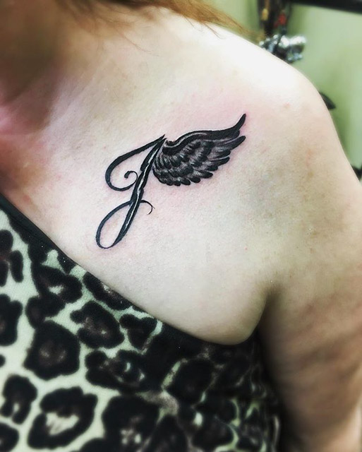 J Letter with Wing Tattoo