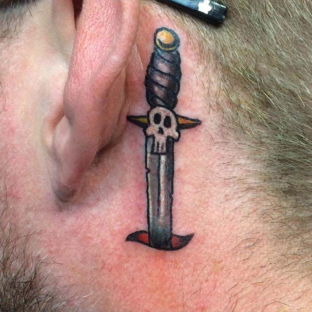 Skull Dagger Tattoo Behind Ear