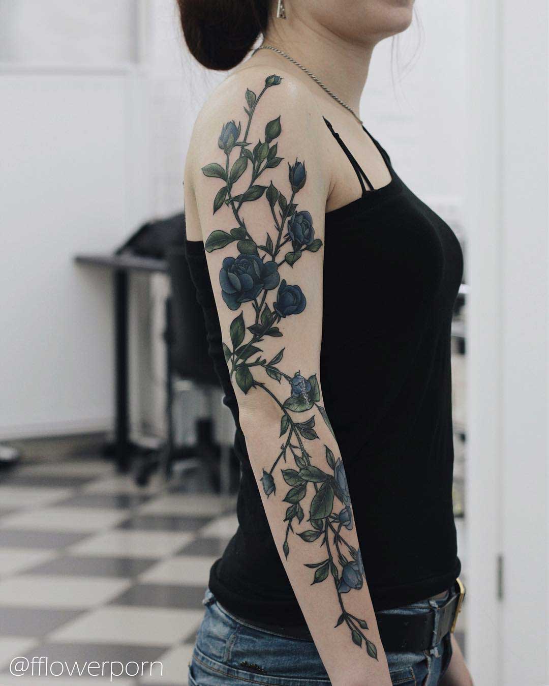 girly flowers tattoo sleeve