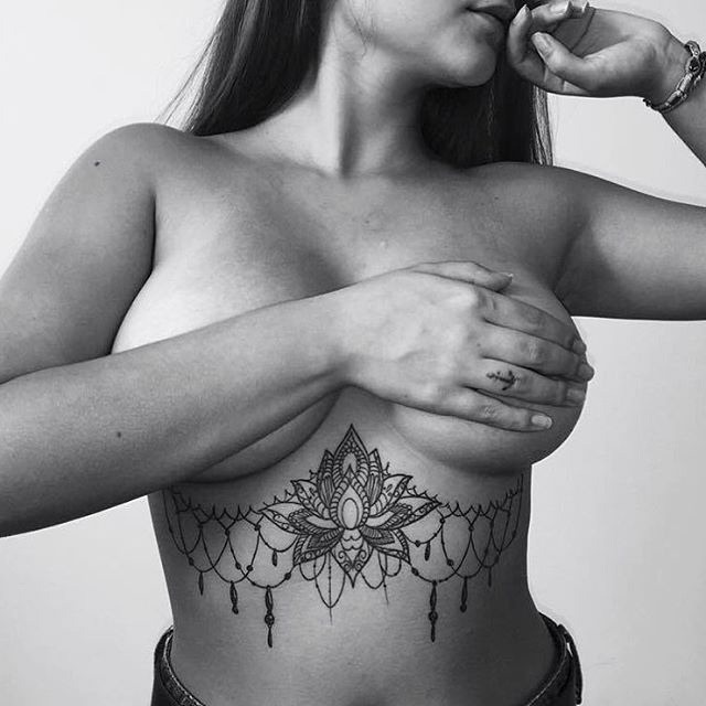 baroque girl tattoo under breast