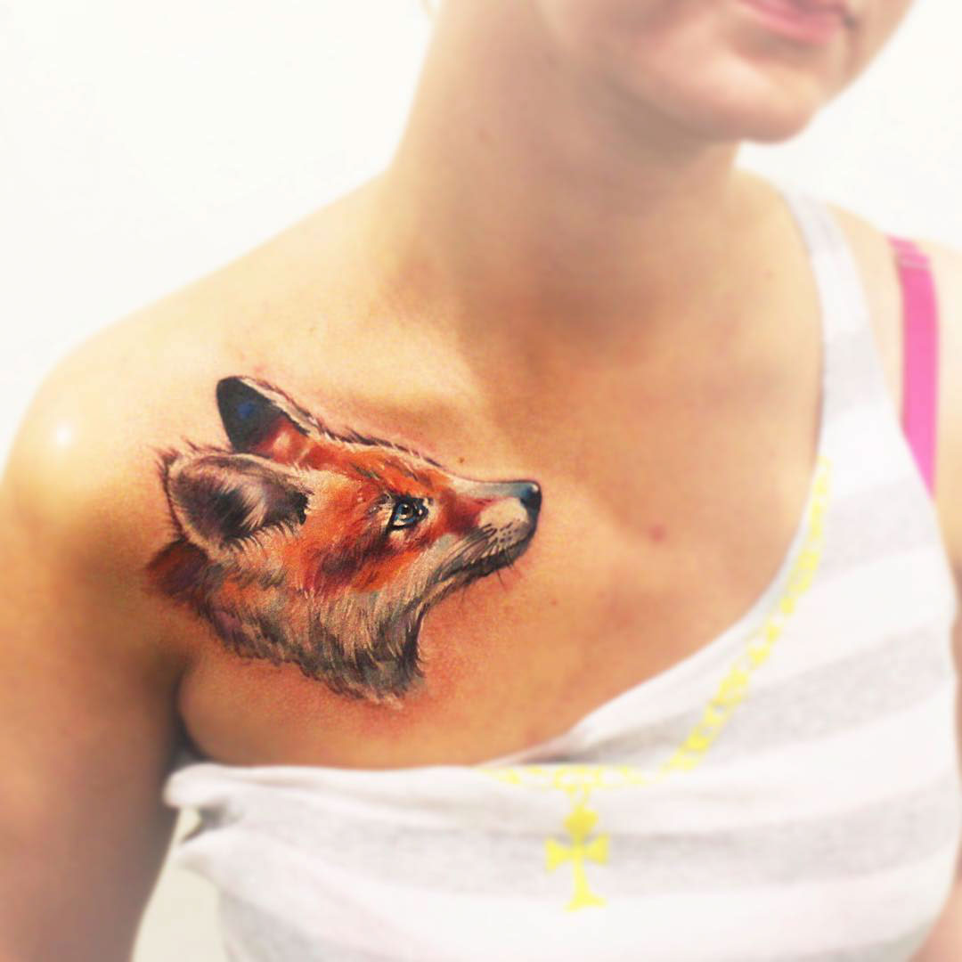red fox tattoo on chest