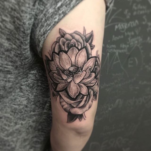 Dotwork Lotus Tricep Tattoo by @genius9aink