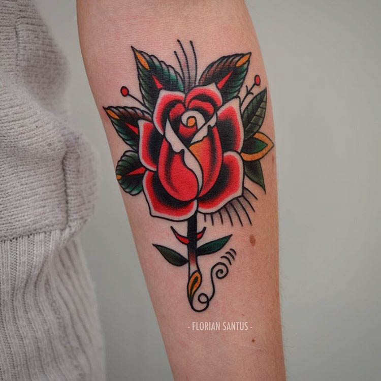 neo-traditional arm rose tattoo