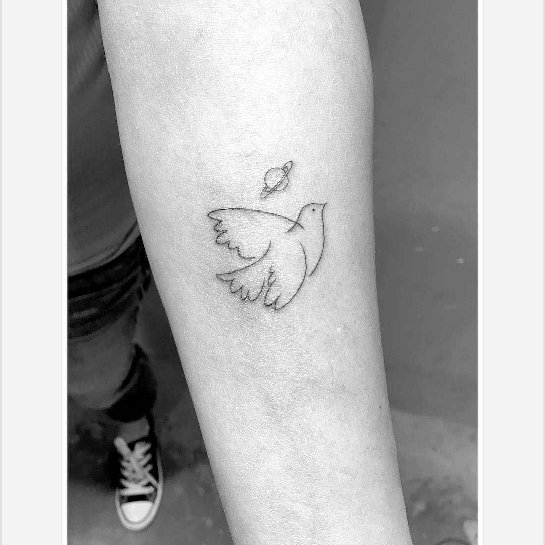small dove tattoo saturn