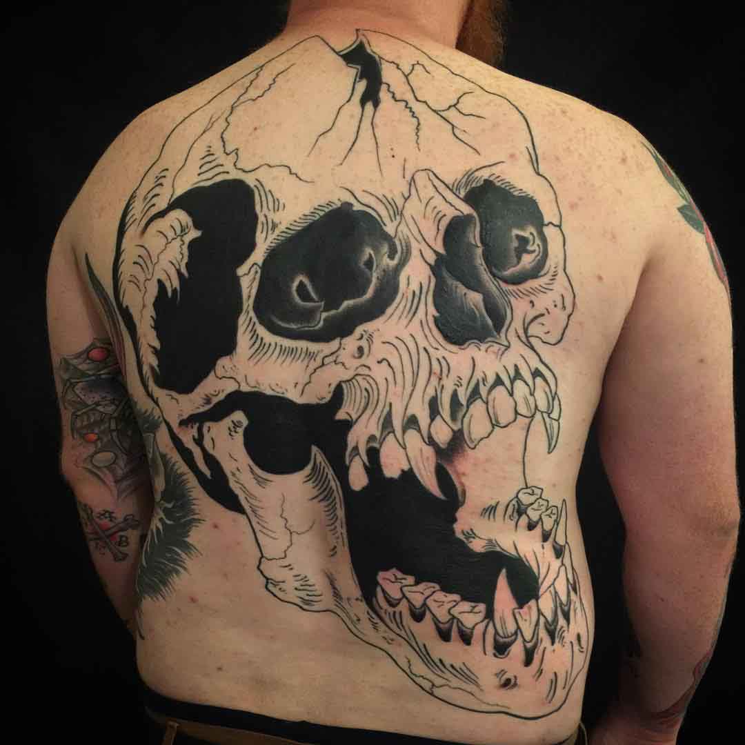 full back skull tattoo blackwork