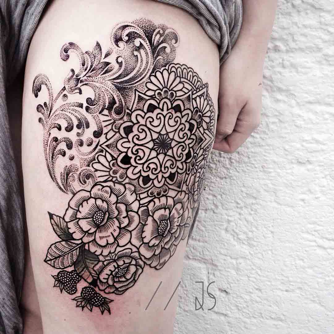flowers thigh tattoo