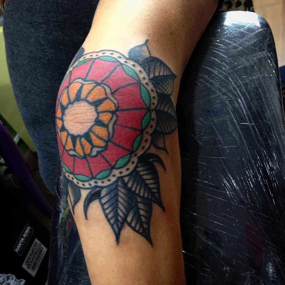 Elbow tattoo traditional