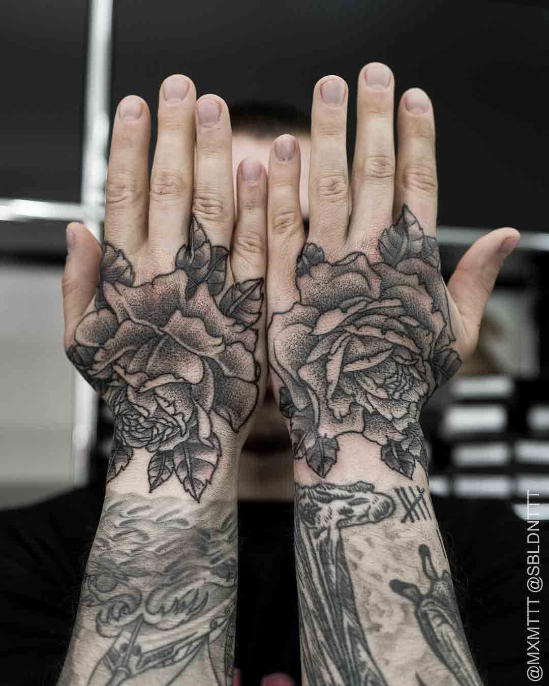 hand tattoos roses dotwork