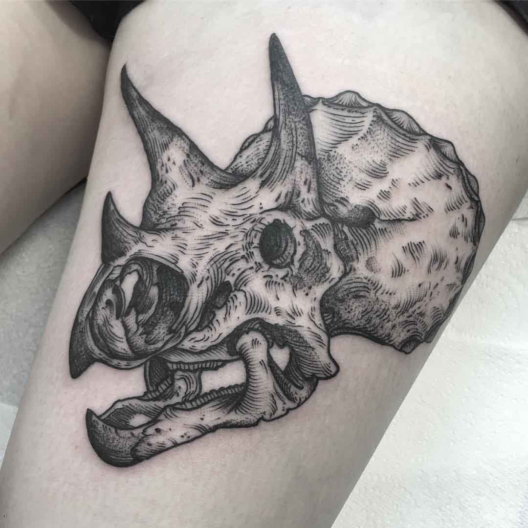 Dinosaur skull tattoo of triceratops