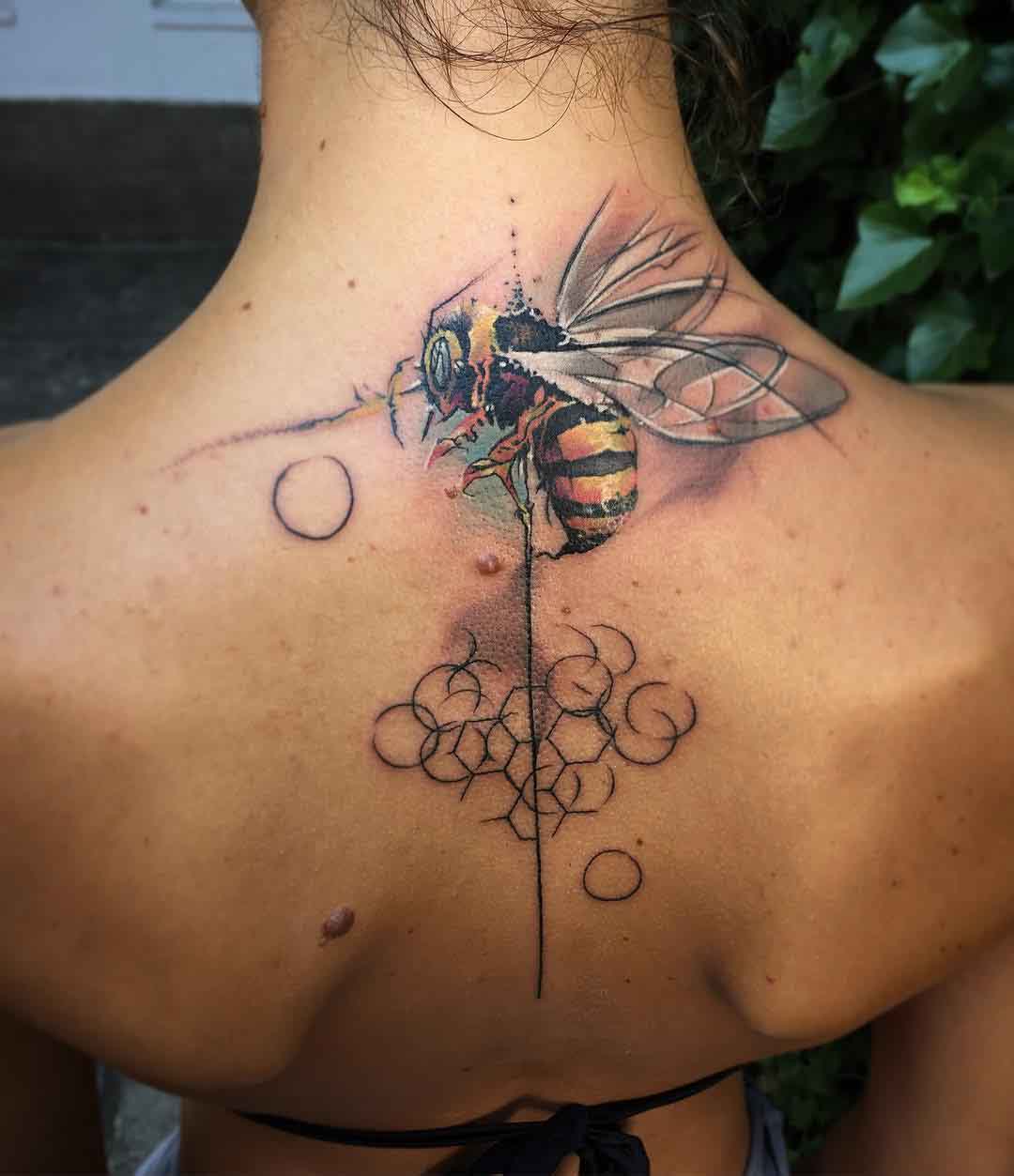 wasp tattoo back neck