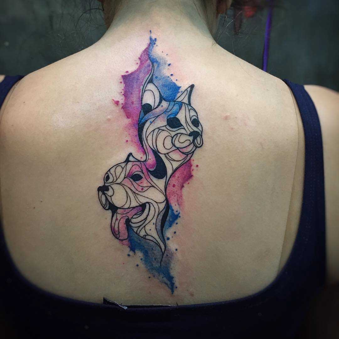 back watercolor tattoo of cant and dog