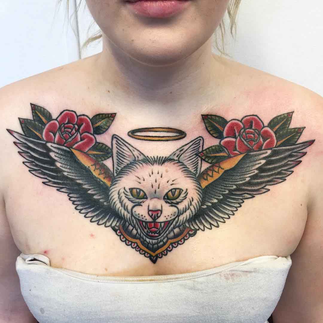 chest tattoo cat with wings