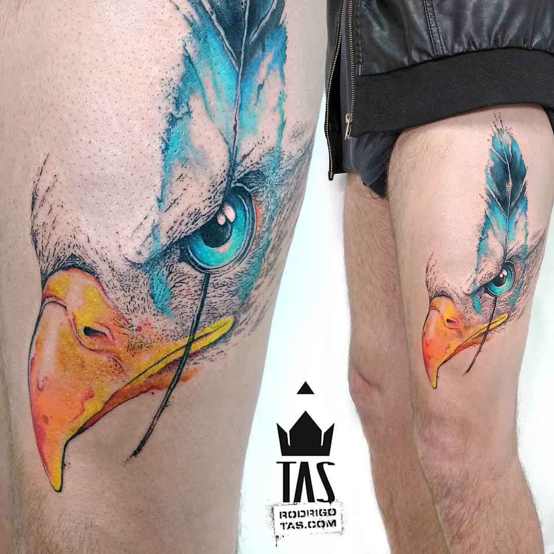 thigh tattoo eagle eye feather