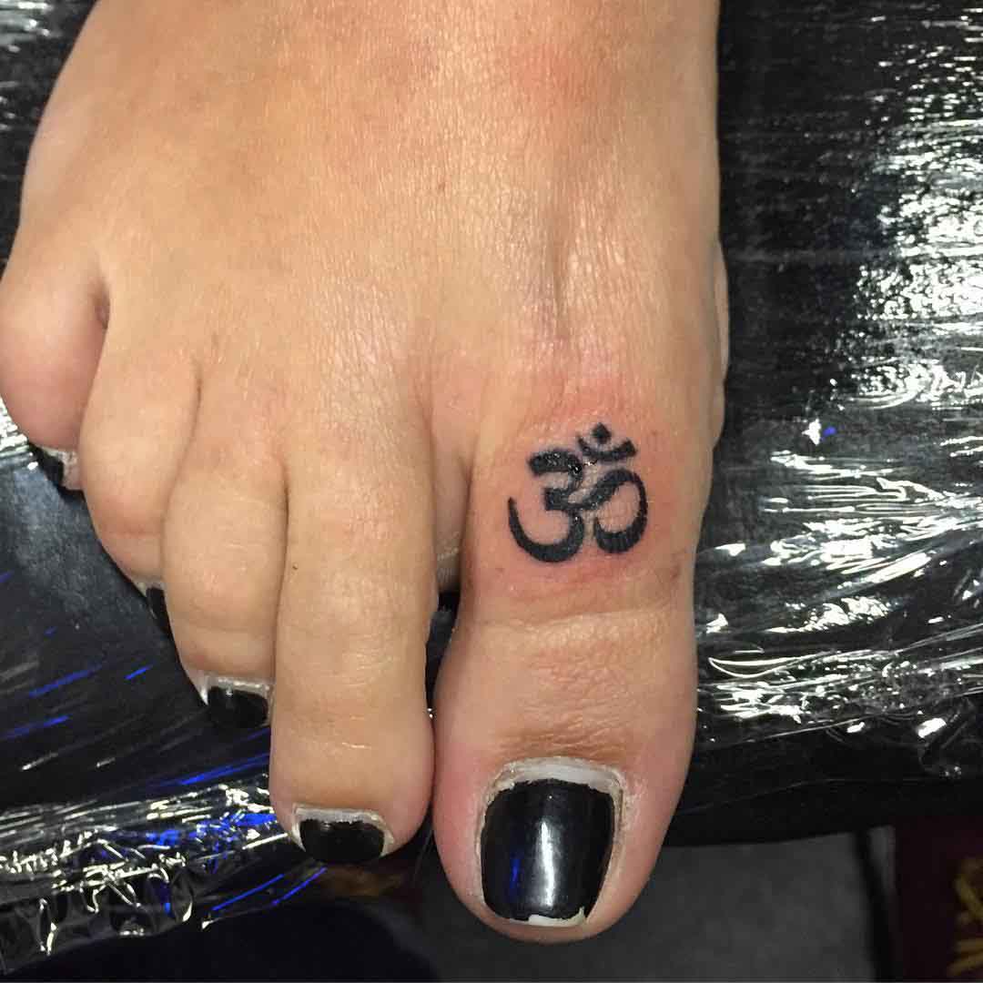 Eastern Symbol Tattoo on Toe by Andrew Woodbury