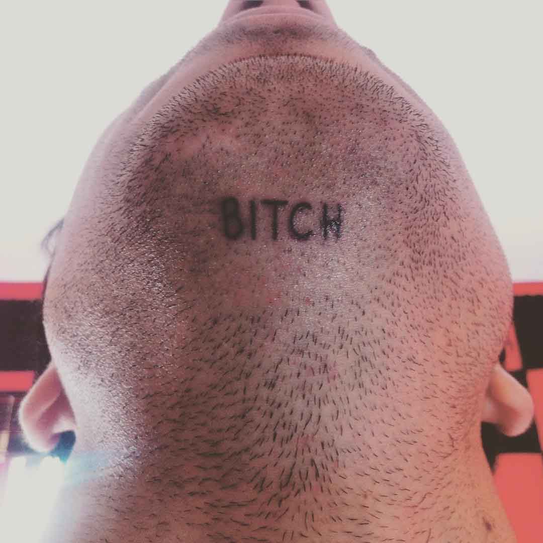Hidden Word Tattoo Under Chin