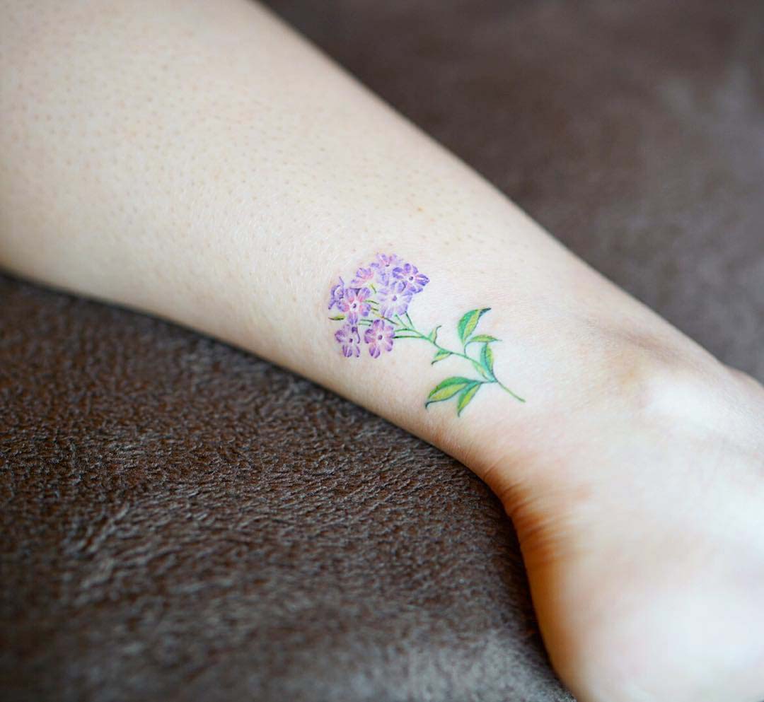 ankle tattoo lilac flower