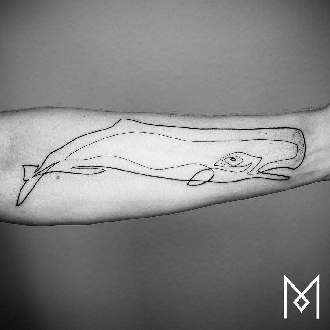 arm tattoo Moby-Dick whale