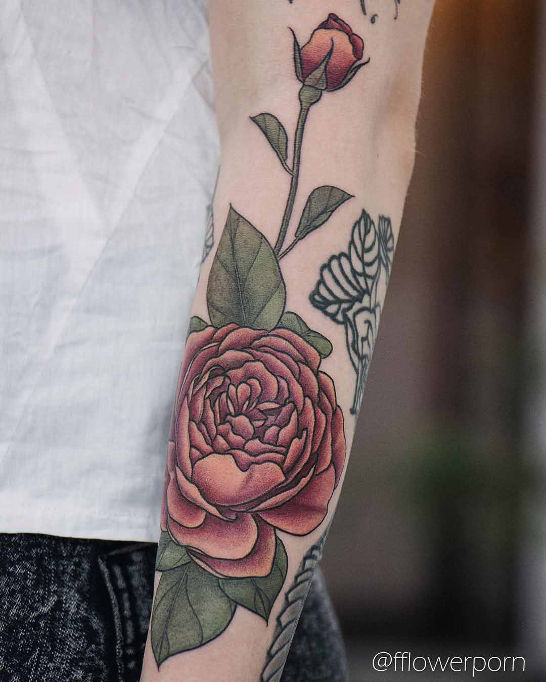 roses tattoo on arm