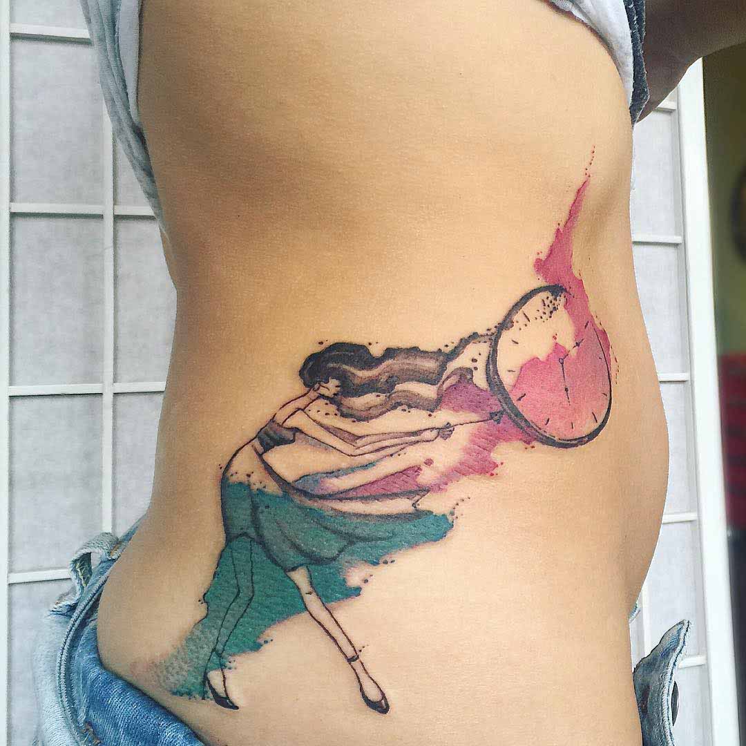 watercolor stomach side tattoo girl