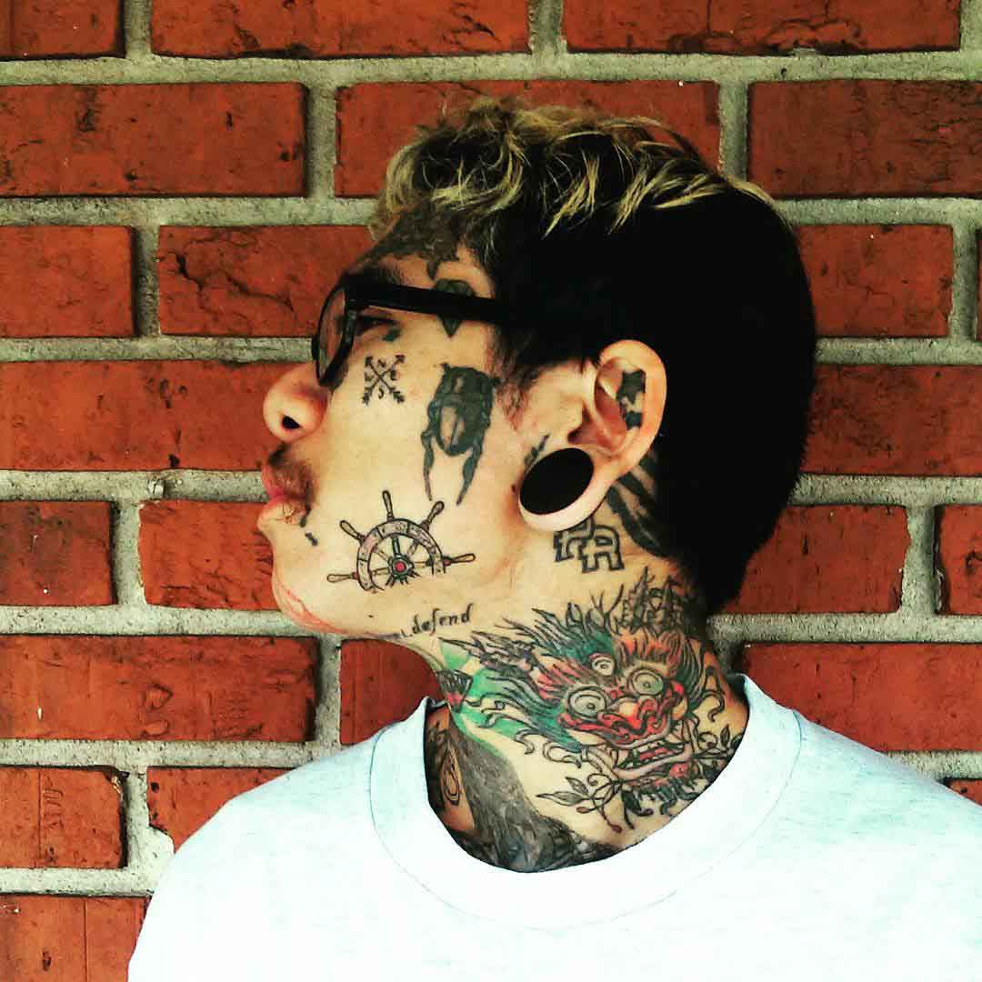 Tattoos on Face by Justin Fong Cruz