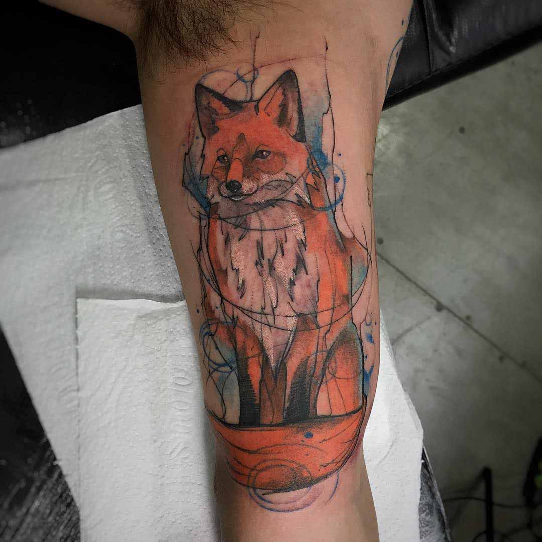 fox tattoo on bicep
